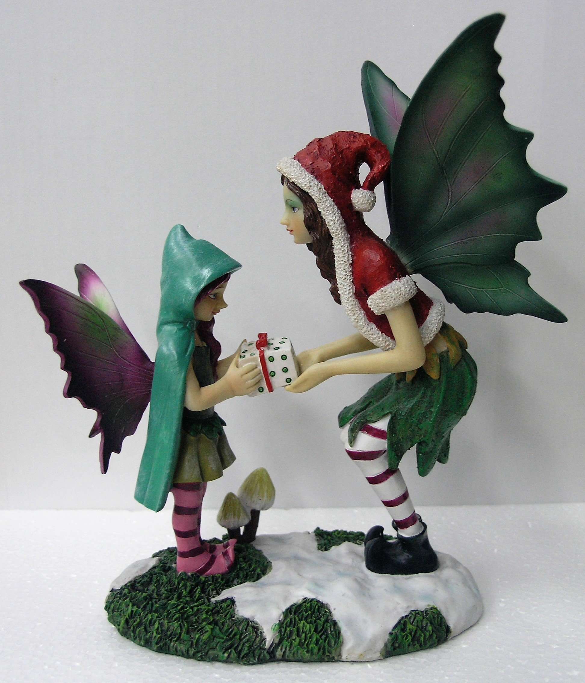 Christmas Fairy with Child & Present Carolina Trading